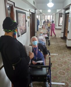 Residents are lined up in the halls to get their COVID-19 vaccination
